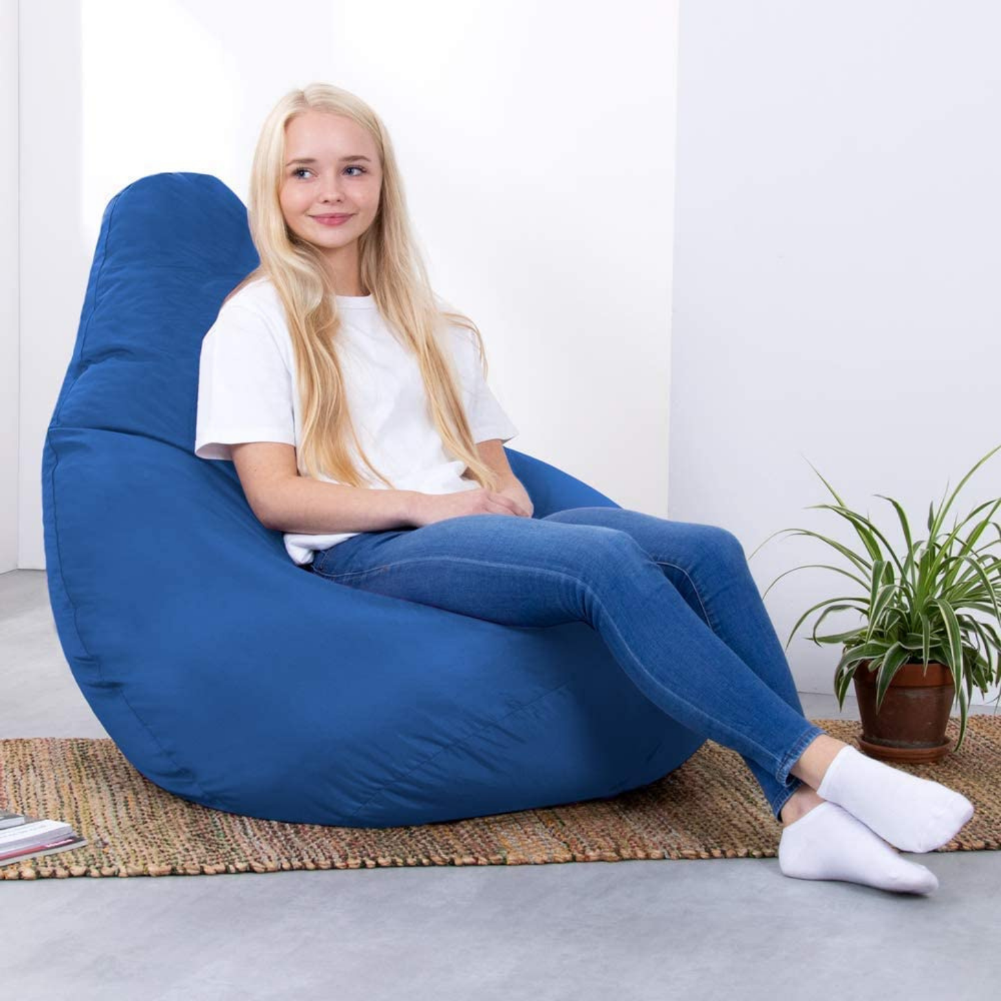 Sensorii's Furniture- girl sat in Sensorii's blue bean bag chair