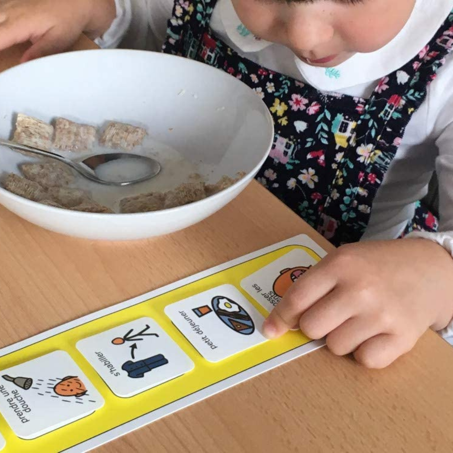 Sensorii's routines- Child using a morning routine whilst eating breakfast
